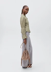 Ruched blouse with ruffles