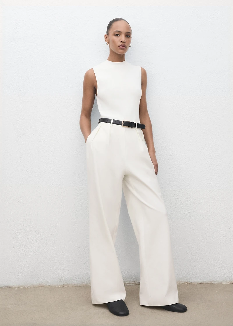 Combined-fabric jumpsuit with belt
