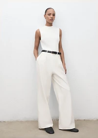 Combined-fabric jumpsuit with belt