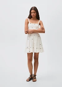 Embroidered cotton dress with floral pattern