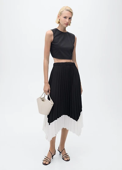 Pleated asymmetric skirt