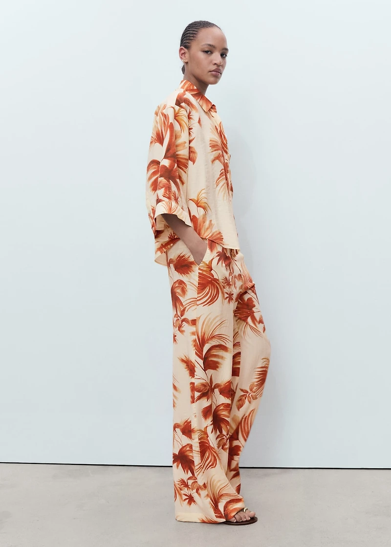 Straight-leg pants with palm tree print