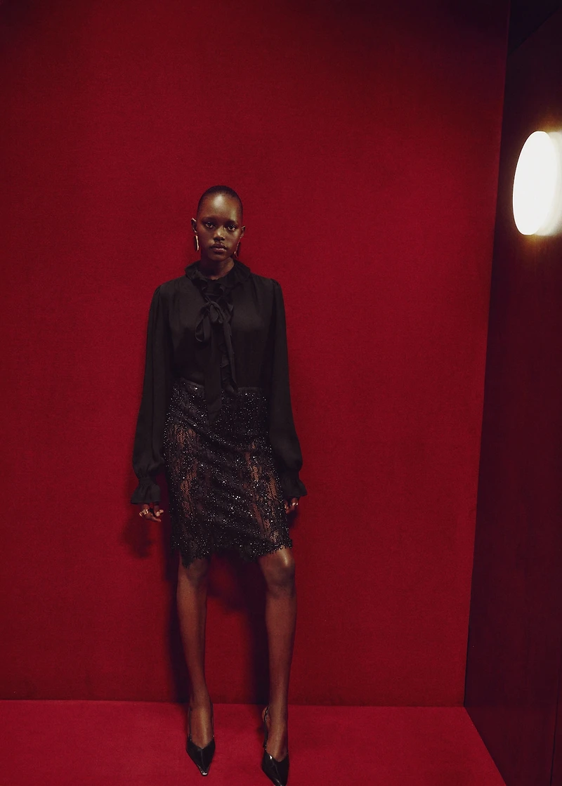 Ruffled blouse with scarf