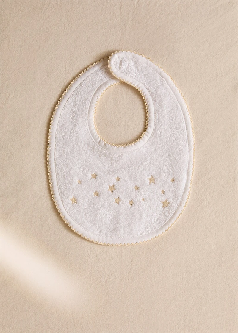 Embroidered cotton bib with stars