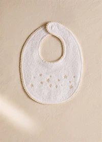 Embroidered cotton bib with stars