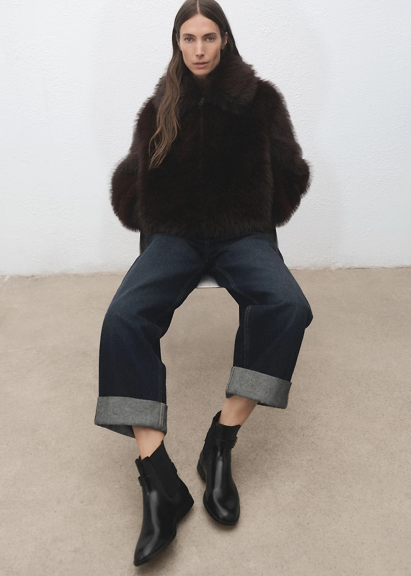 Ankle boots with elastic panel and buckle