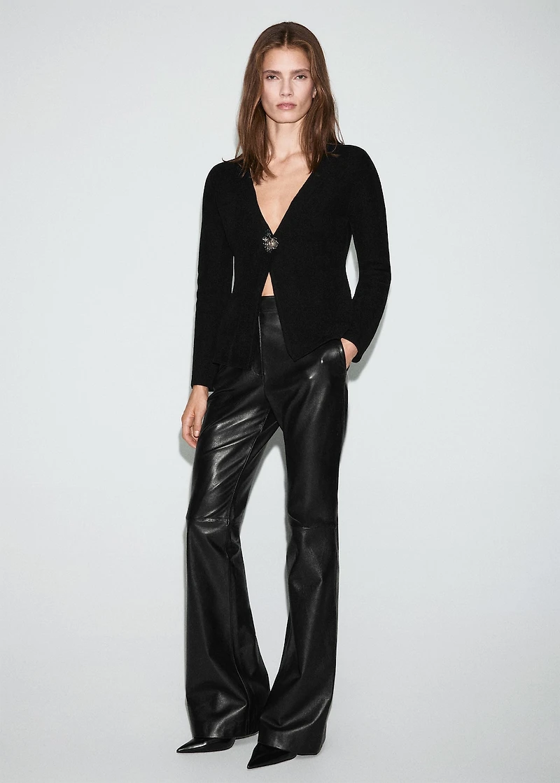 Knitted cardigan with jewel button