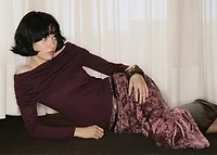 Fitted sweater with draped neckline