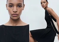 Boat-neck dress with pleats