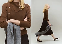 Sweater with asymmetrical neck and buttons
