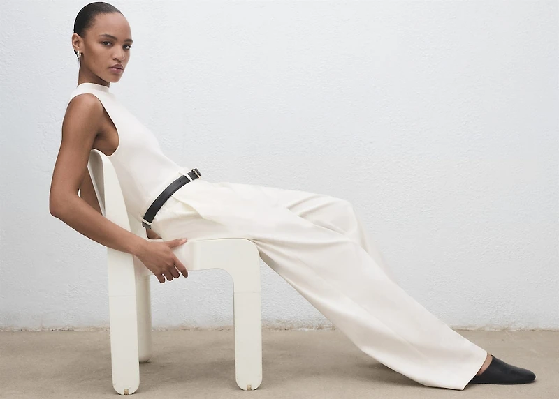 Combined-fabric jumpsuit with belt