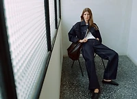 Denim jacket with decorative stitching