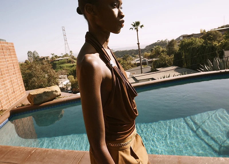 Draped top with metallic detail