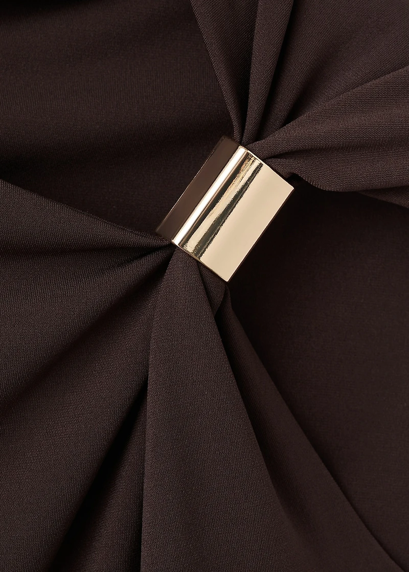 Top with asymmetrical neckline and metallic detail