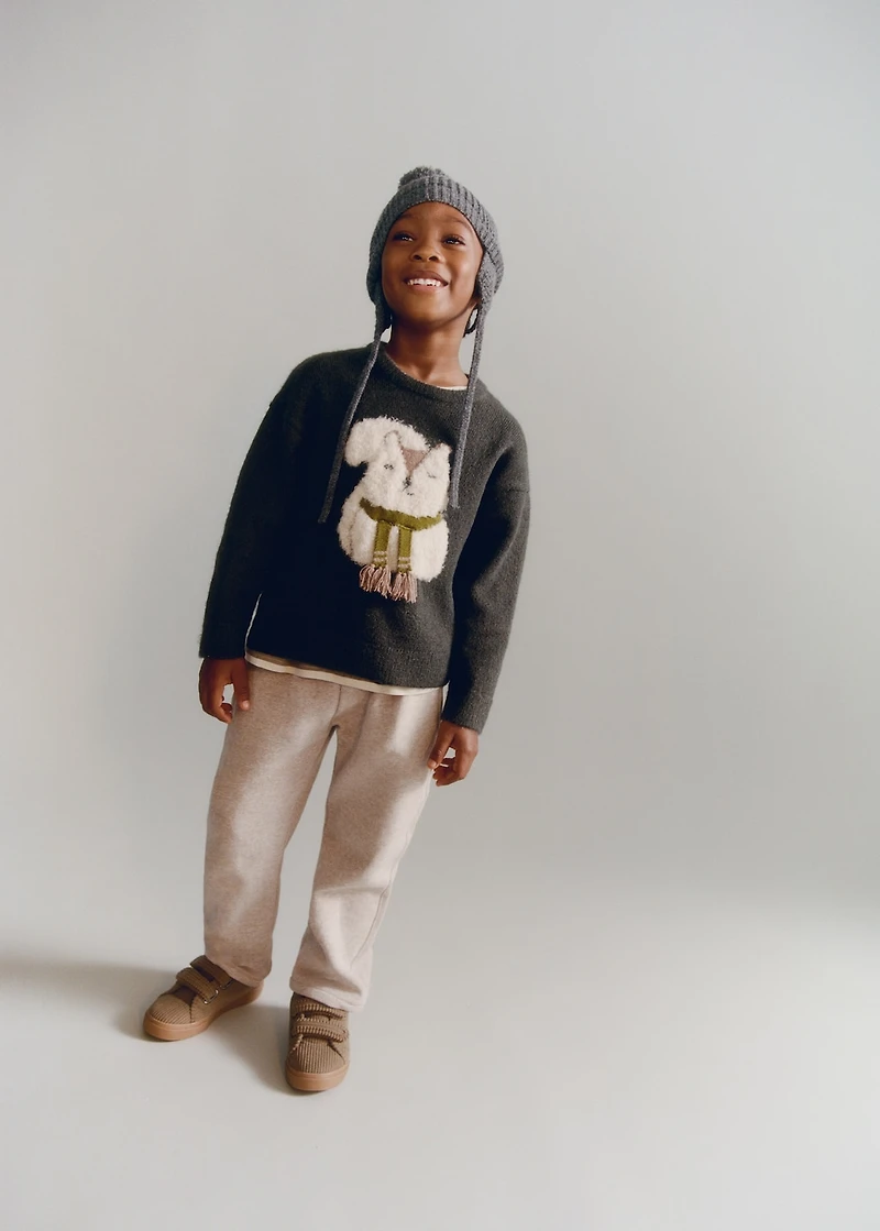 Sweater with embroidered animal