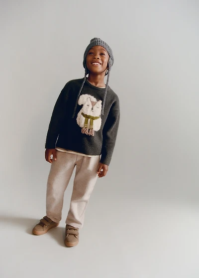 Sweater with embroidered animal