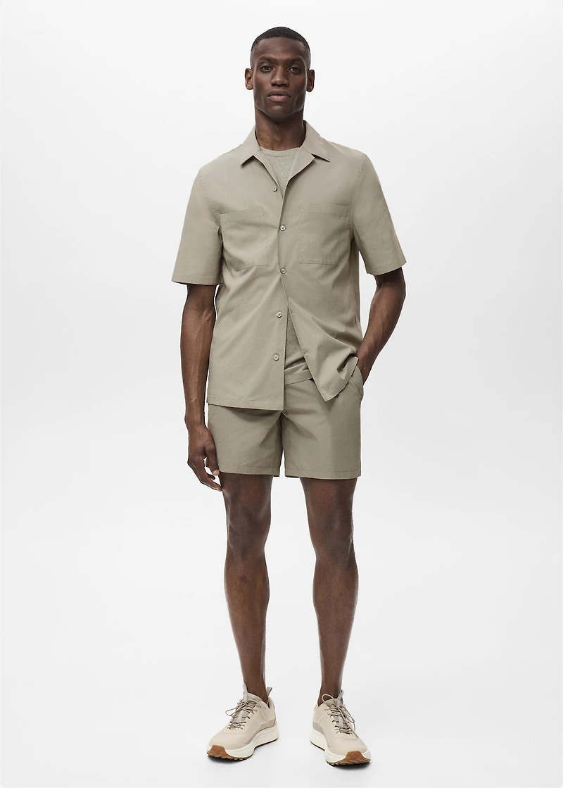 Shirt with pockets and bowling collar