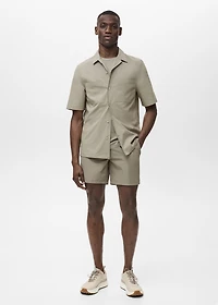 Shirt with pockets and bowling collar