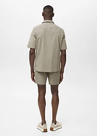 Shirt with pockets and bowling collar