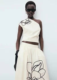 Asymmetrical flower-embroidered top