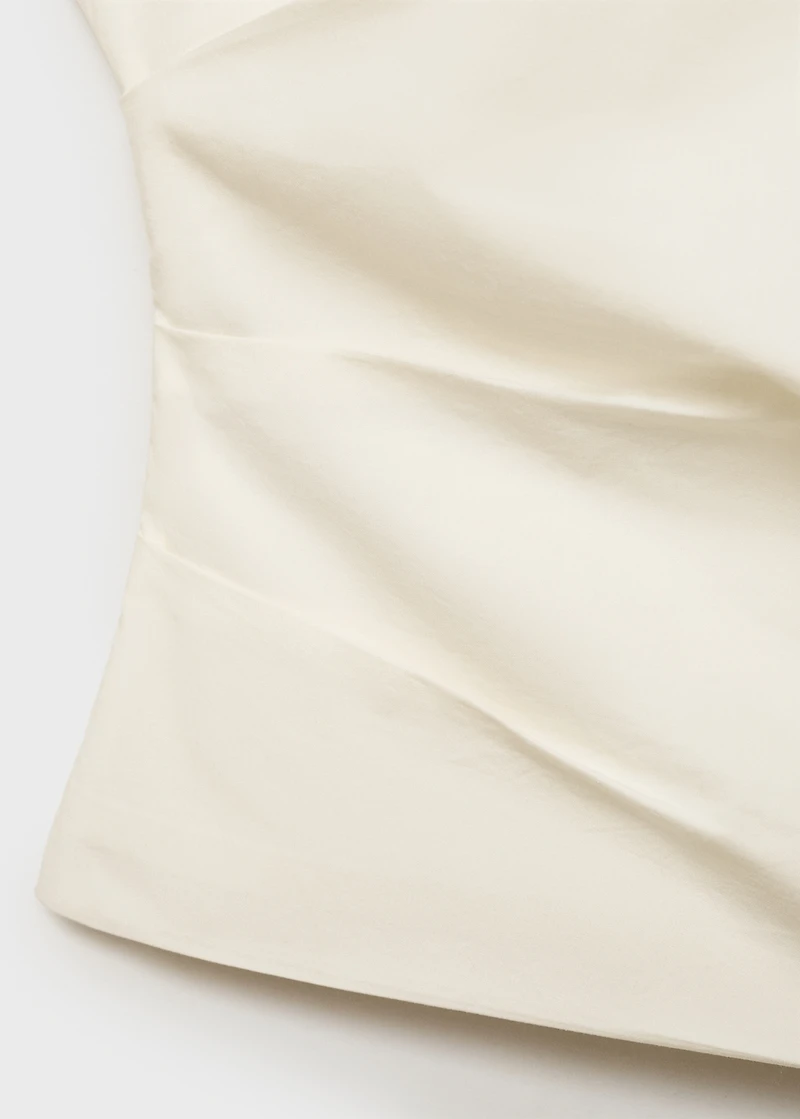 Asymmetrical flower-embroidered top