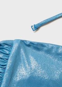 Swimsuit with a shiny finish and cut-out