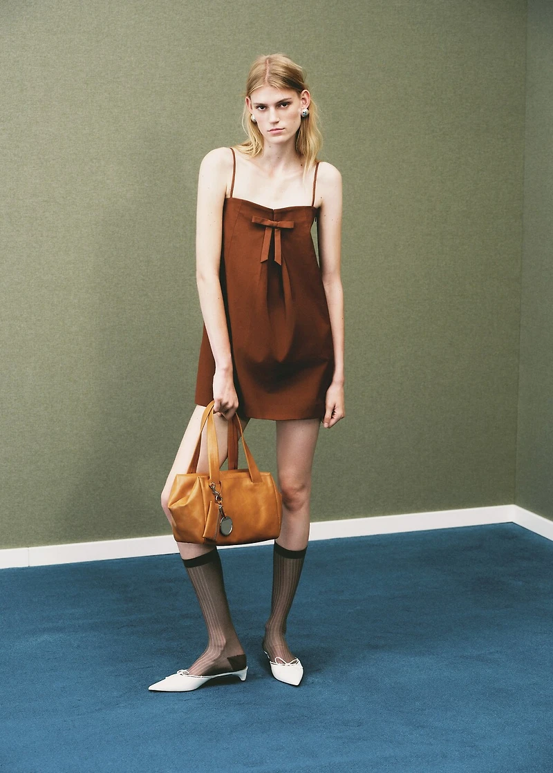 Dress with bow neckline