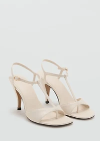 Heeled leather sandals with straps