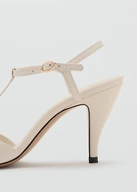 Heeled leather sandals with straps