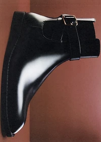 Ankle boots with elastic panel and buckle