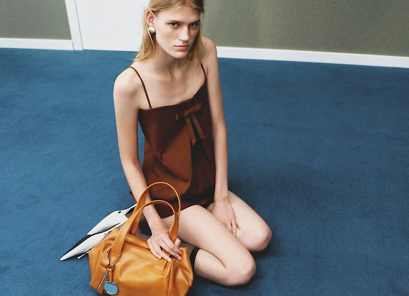 Dress with bow neckline