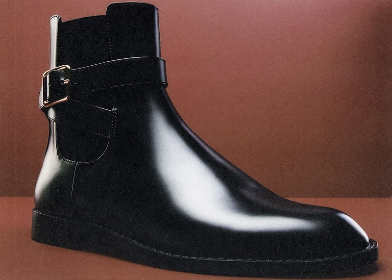 Ankle boots with elastic panel and buckle