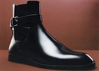 Ankle boots with elastic panel and buckle