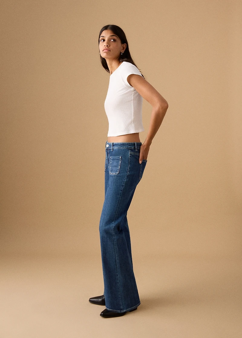 Flared jeans with studs