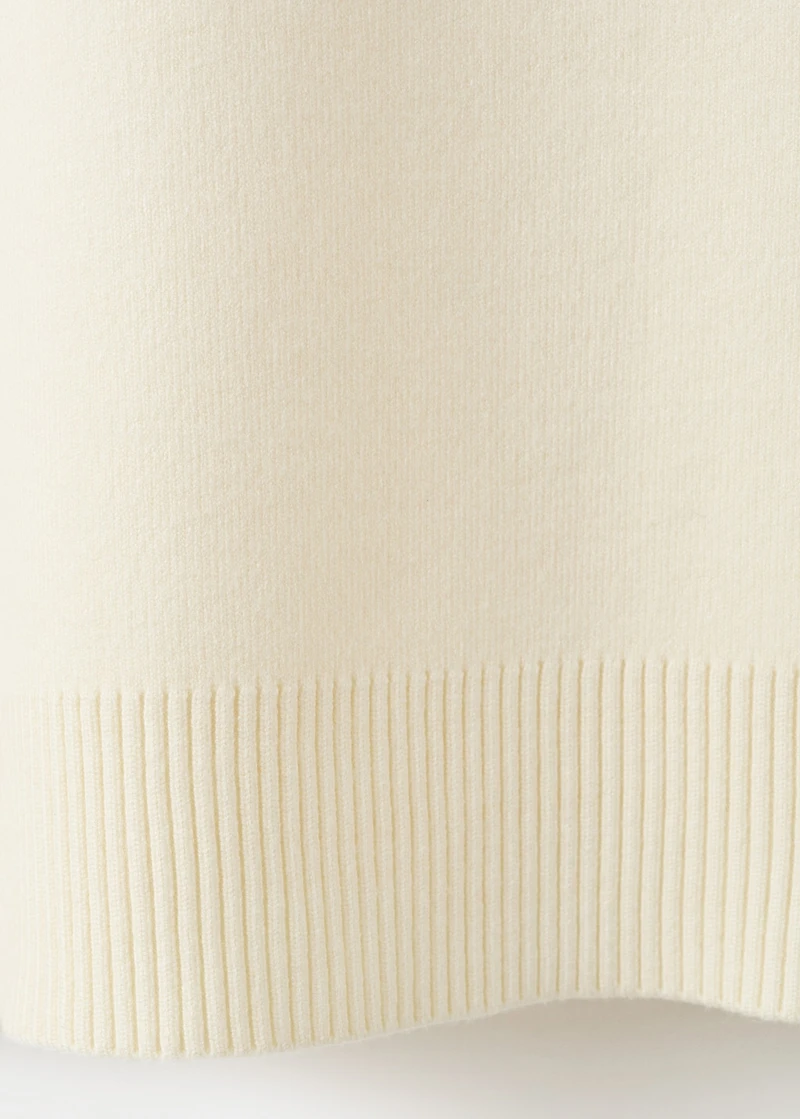 Knitted sweater with jewel buttons