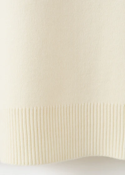 Knitted sweater with jewel buttons