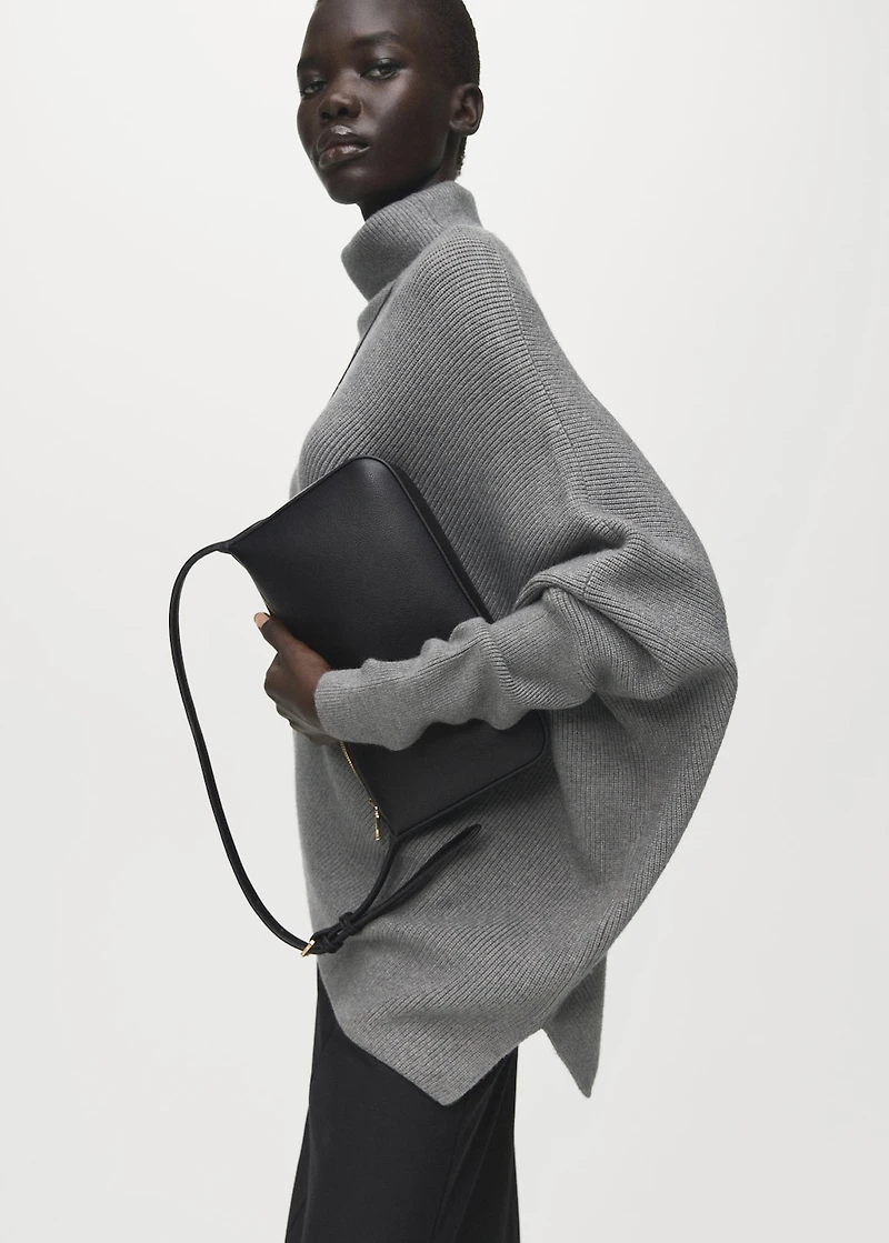 Sweater with asymmetrical roll neck