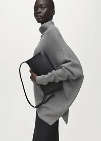 Sweater with asymmetrical roll neck