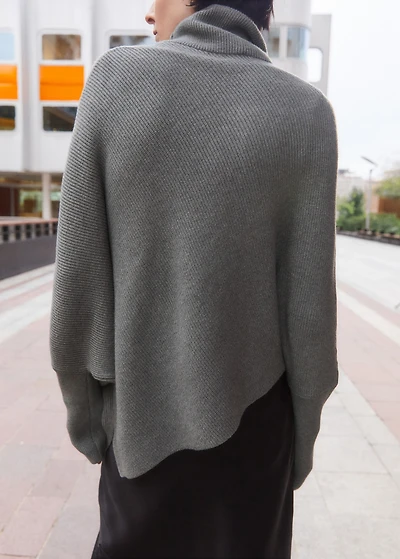 Sweater with asymmetrical roll neck