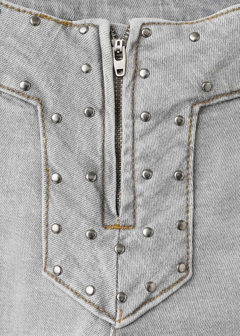 Low-waist studded jeans