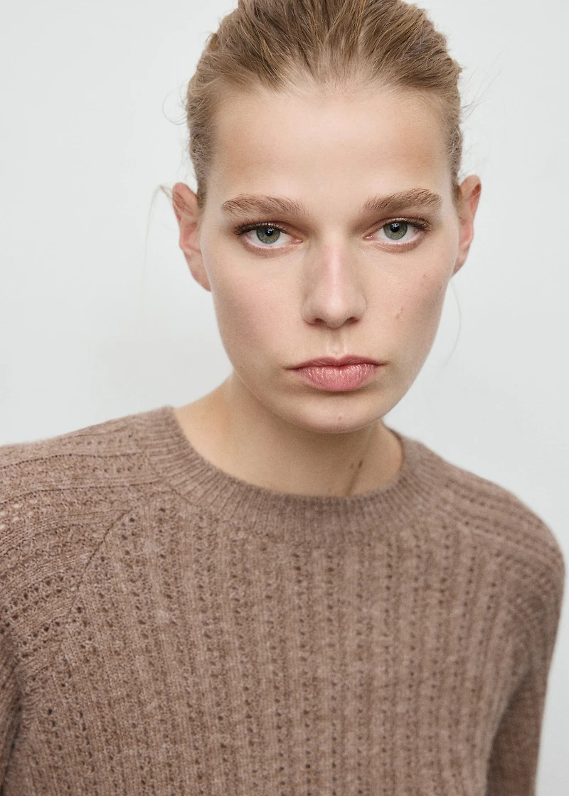 Knit sweater with lace pattern