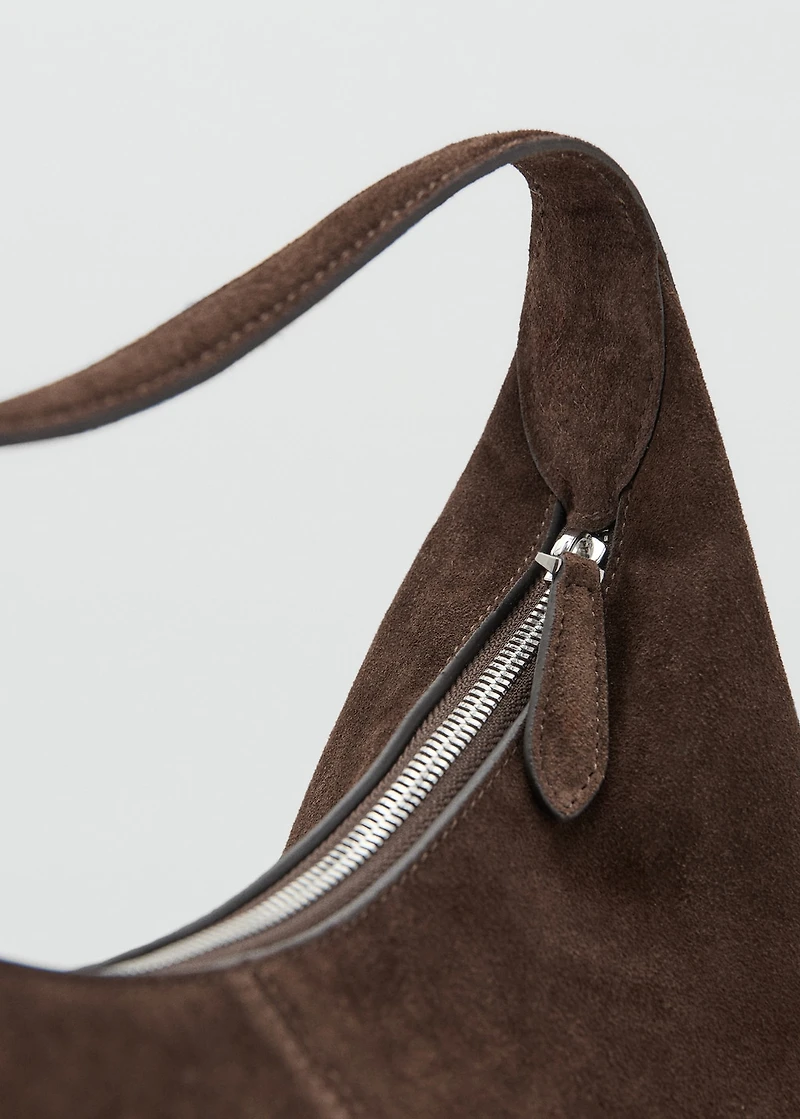 Suede shoulder bag with stitching