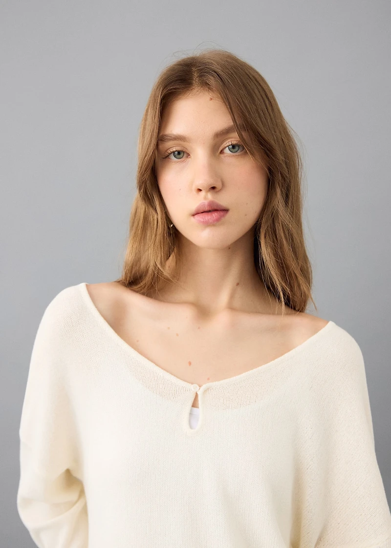 Cut-out knitted sweater
