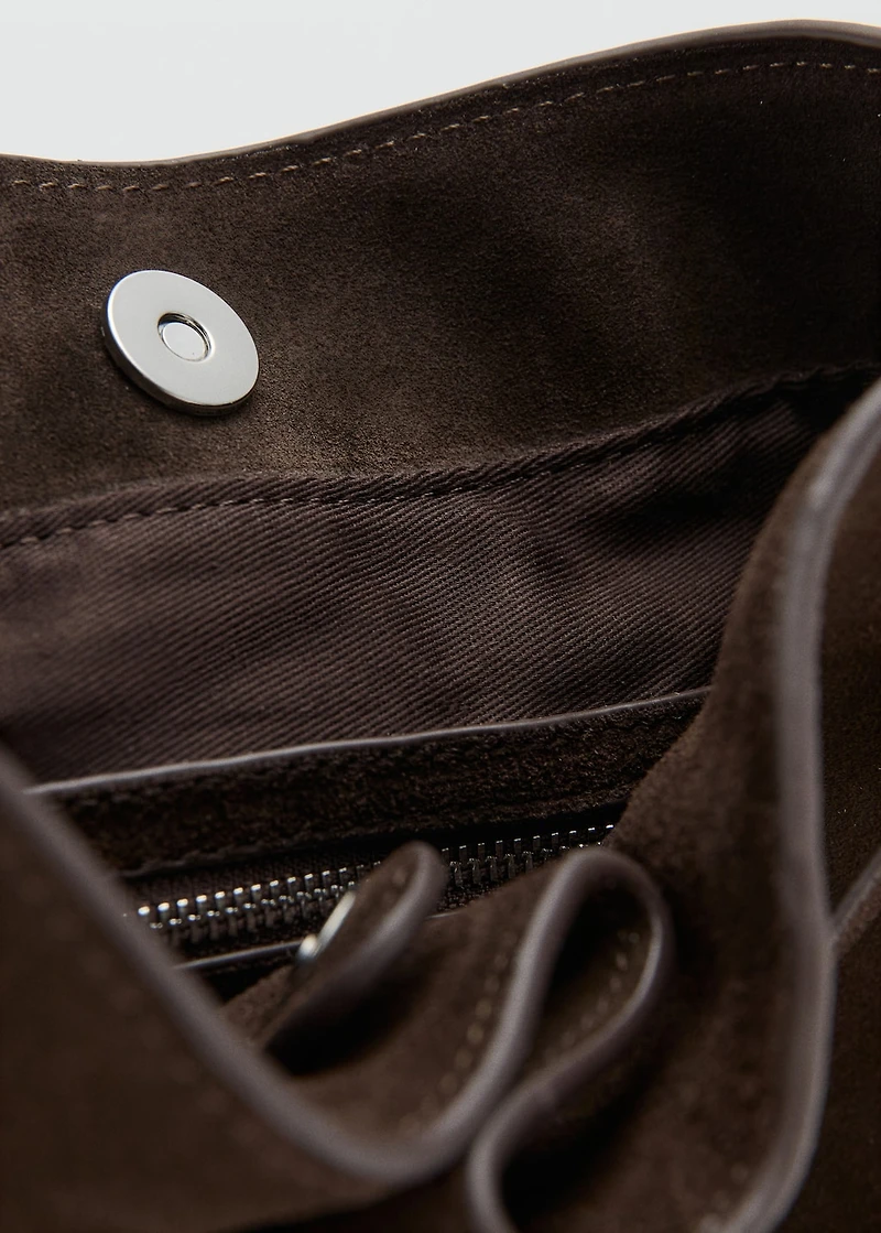 Suede bucket bag with buckle