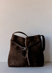 Suede bucket bag with buckle