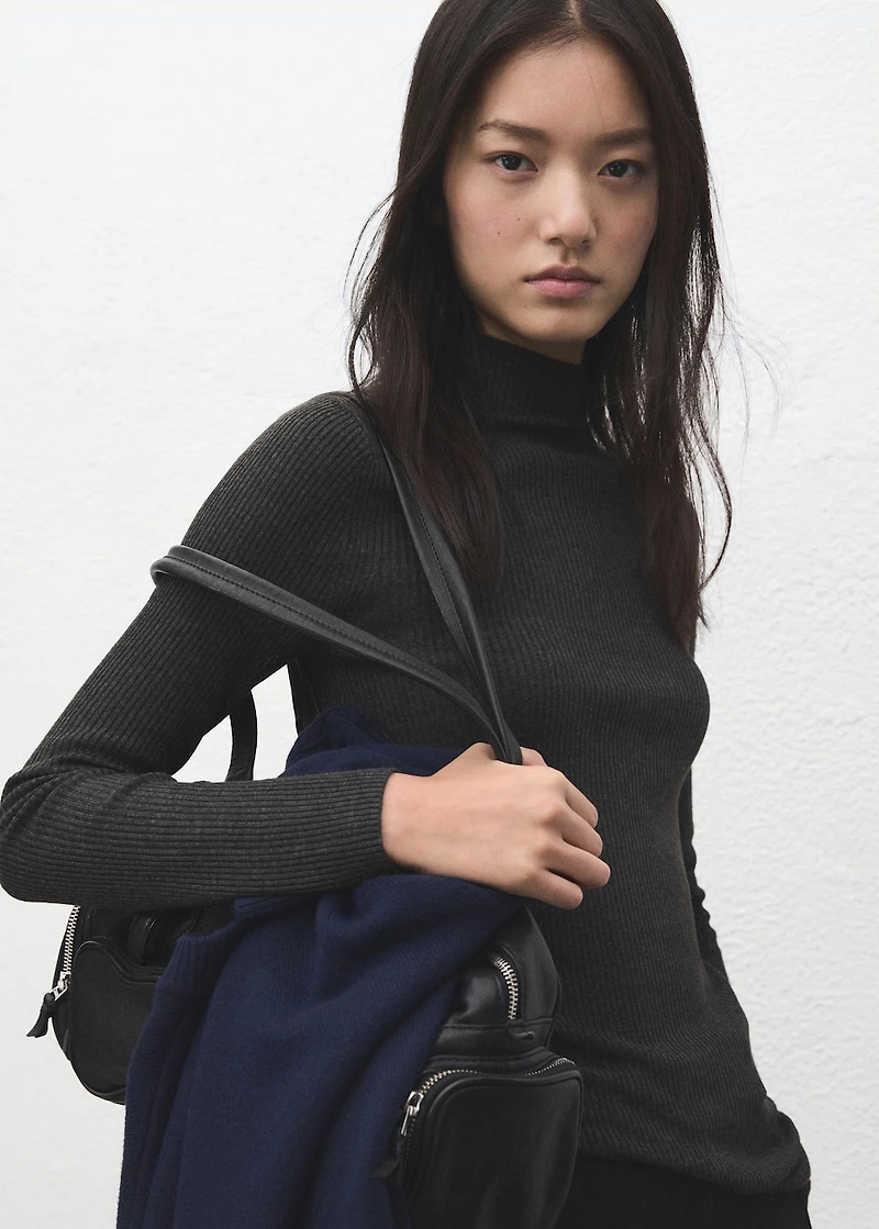 Sweater with asymmetrical turtleneck