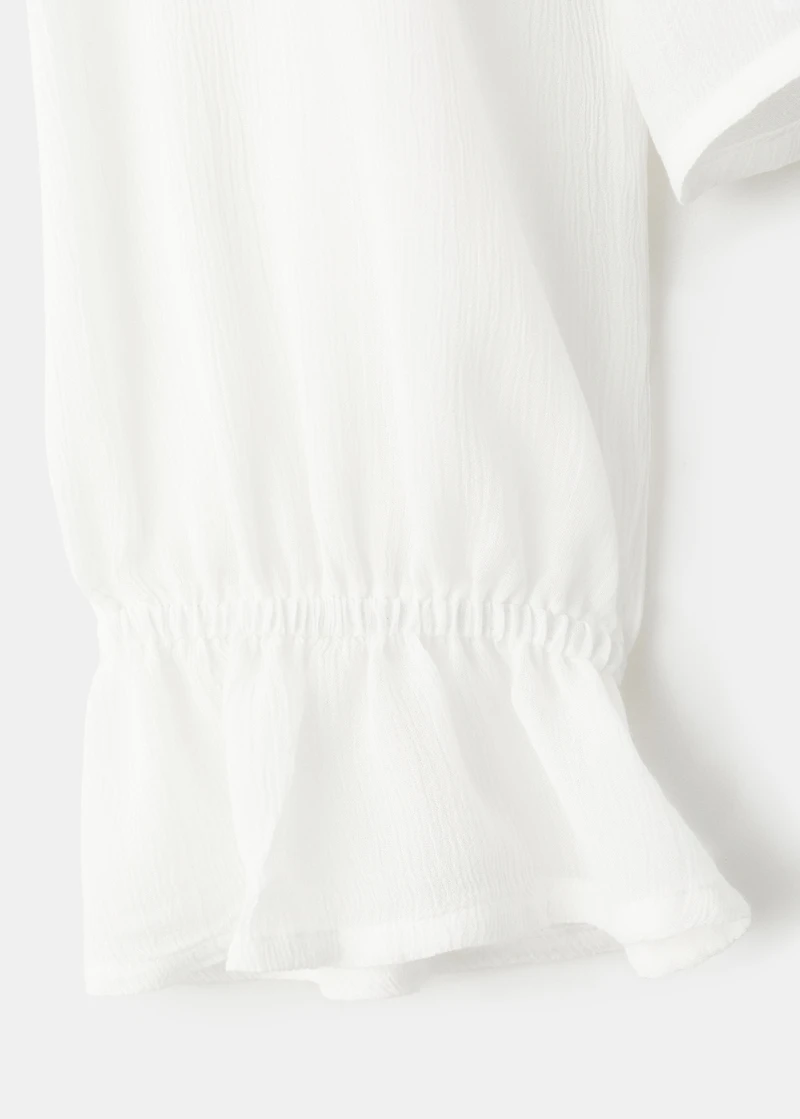 Fluid ruffled blouse