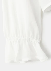 Fluid ruffled blouse