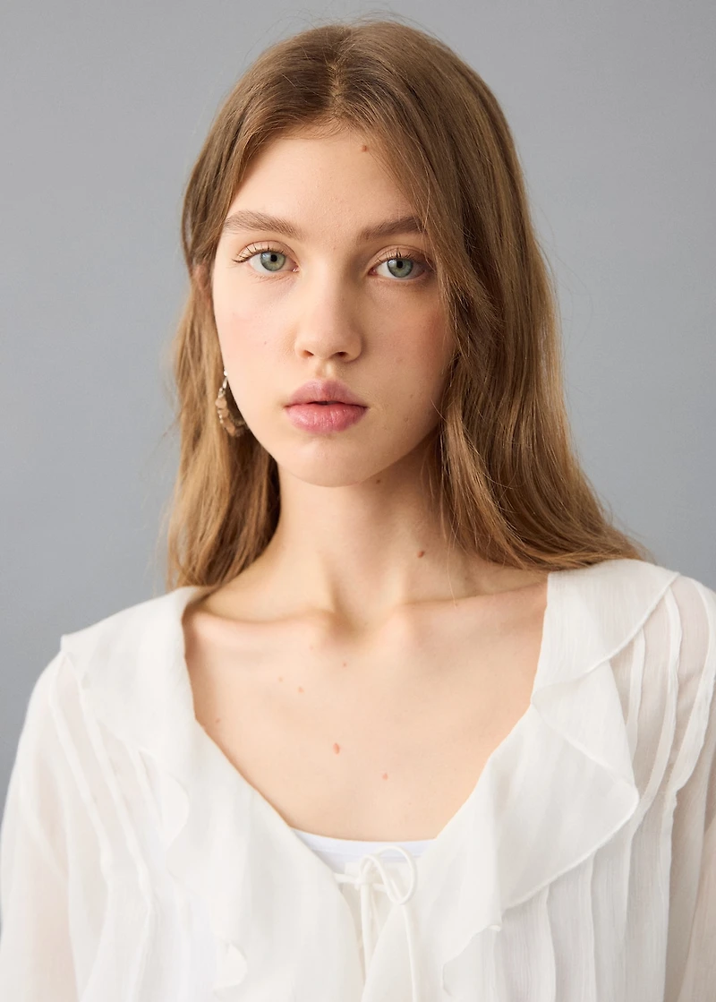 Fluid ruffled blouse