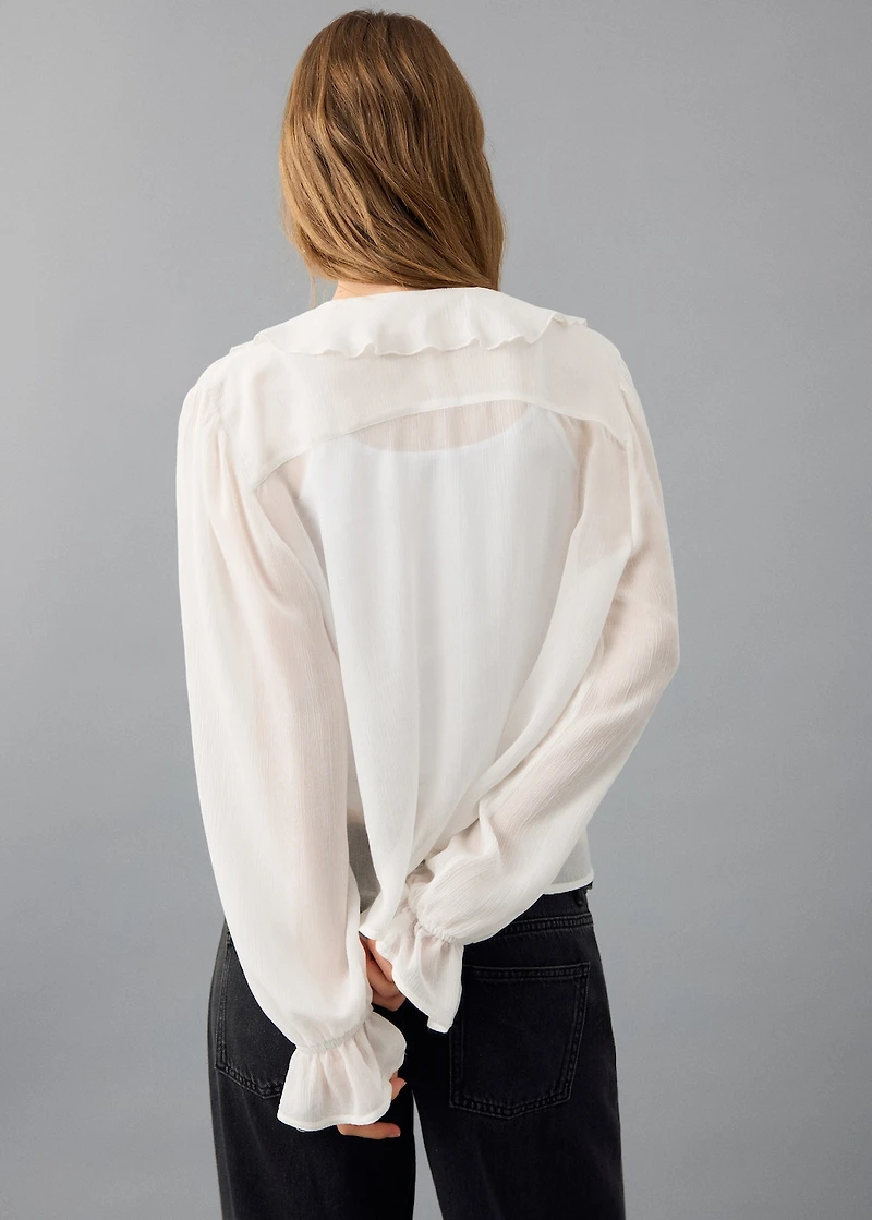 Fluid ruffled blouse